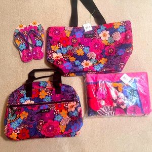 Sets of  traveling beach sets towel flip flop tote and duffel bag.